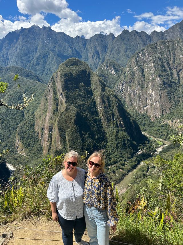 Reisspecialisten bij uitzichtpunt Machu Picchu
